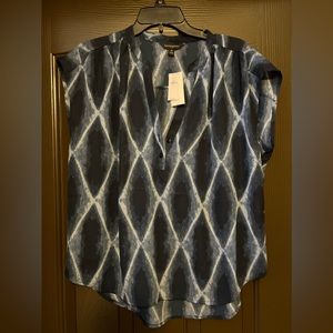 Very lighter off short sleeev blouse by Banana Republic and never worn